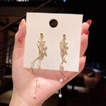 Aretes de Estrella largos con perlas