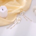 Aretes de Ostra Blanca con Perlas