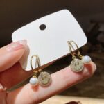 Aretes Carita Feliz con Perla