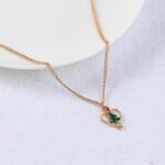 Collar dorado corazon arbol de navidad por dentro