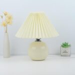 Lampara con base de ceramica redonda crema