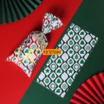 Paquete 50 bolsitas de Navidad verde 13x27cm