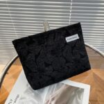 Bolso de cosméticos de alta gama flores negro